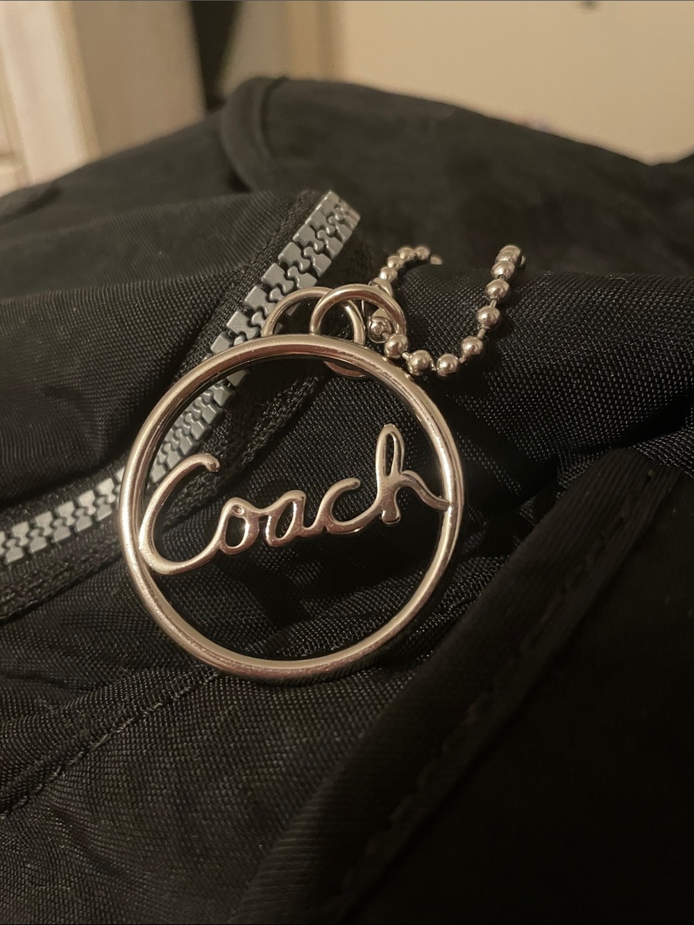 Coach Circle Hand Tag